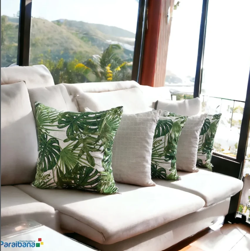 Ambiente decorado com almofadas e produtos da Paraibana
